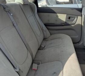 junkyard find 2004 kia spectra with 448 559 miles