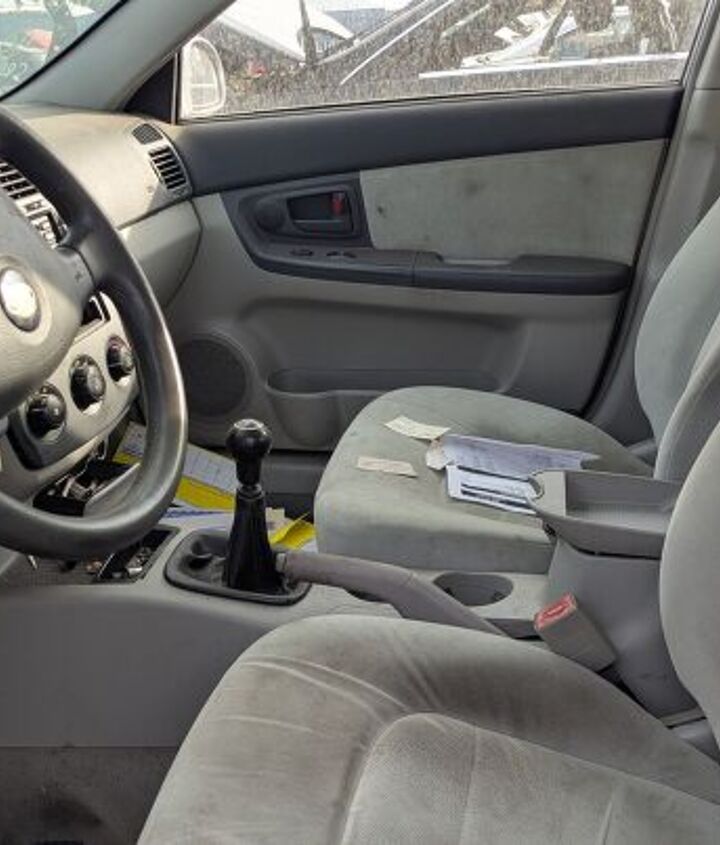 junkyard find 2004 kia spectra with 448 559 miles