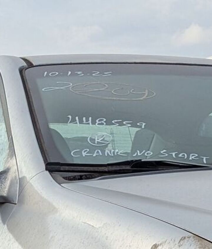 junkyard find 2004 kia spectra with 448 559 miles