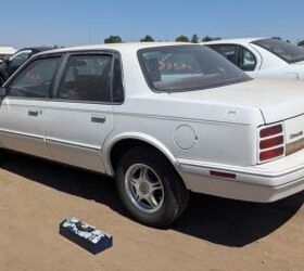 junkyard find 1993 oldsmobile cutlass ciera s with 306 842 miles