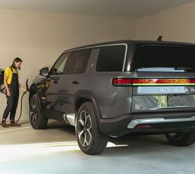 rivian grows revenue cuts losses as it readies for q2 debut of all new r2