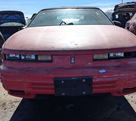 junkyard find 1994 oldsmobile cutlass supreme convertible