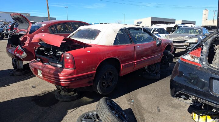 junkyard find 1994 oldsmobile cutlass supreme convertible
