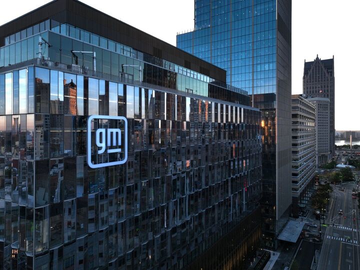 gm firing hundreds while bringing in foreign workers