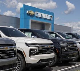 gm firing hundreds while bringing in foreign workers