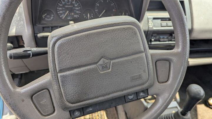 junkyard find 1992 plymouth sundance duster