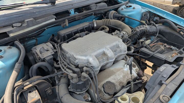 junkyard find 1992 plymouth sundance duster