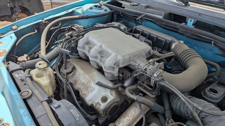 junkyard find 1992 plymouth sundance duster