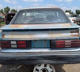 junkyard find 1992 plymouth sundance duster