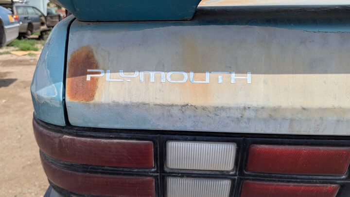 junkyard find 1992 plymouth sundance duster
