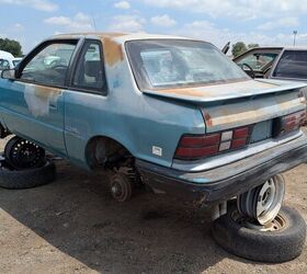 junkyard find 1992 plymouth sundance duster