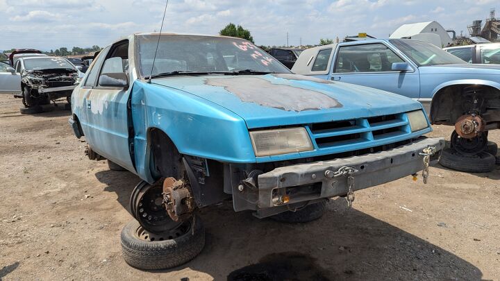 junkyard find 1992 plymouth sundance duster