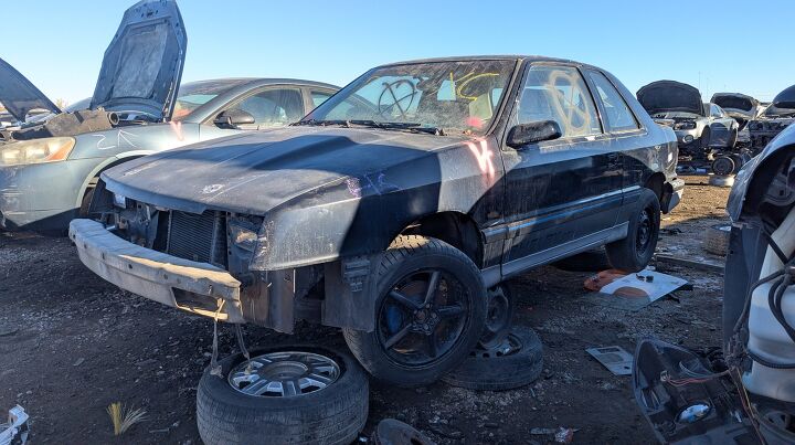 junkyard find 1992 plymouth sundance duster