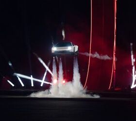 tesla s bet robotaxis robots and a spacex merger