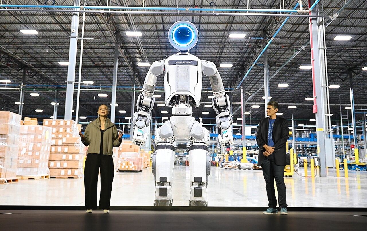 question of the day robots or humans as new vehicle builders