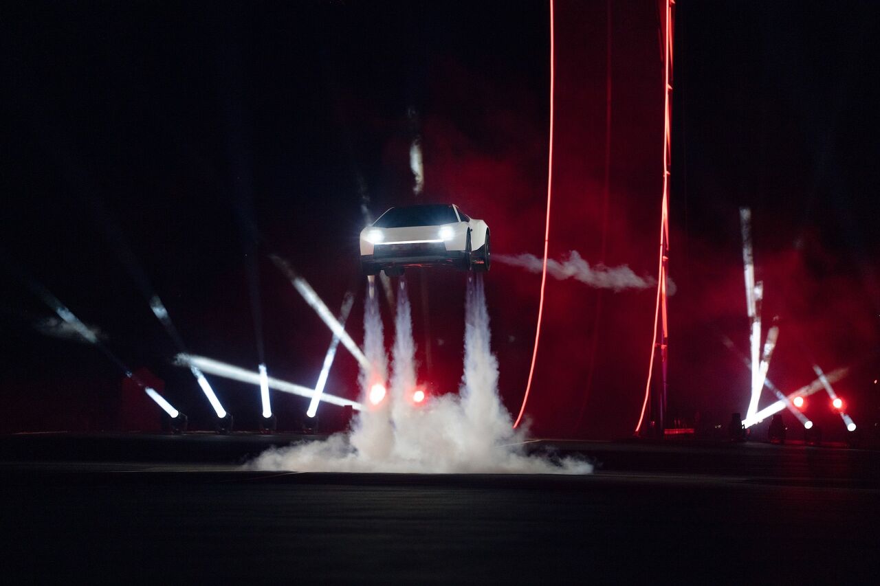 tesla s bet robotaxis robots and a spacex merger